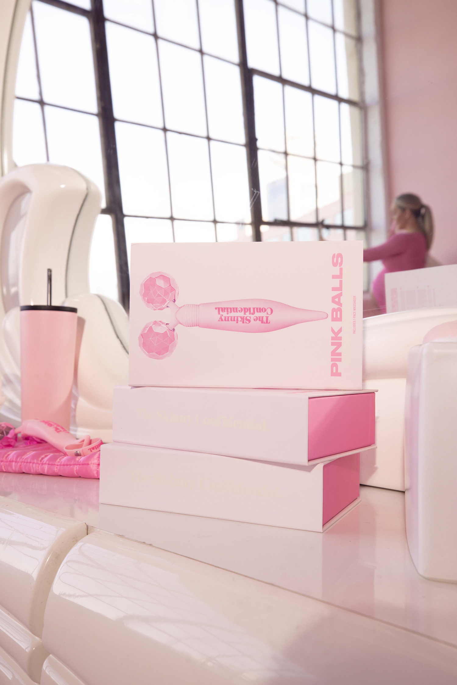 pink balls face massager