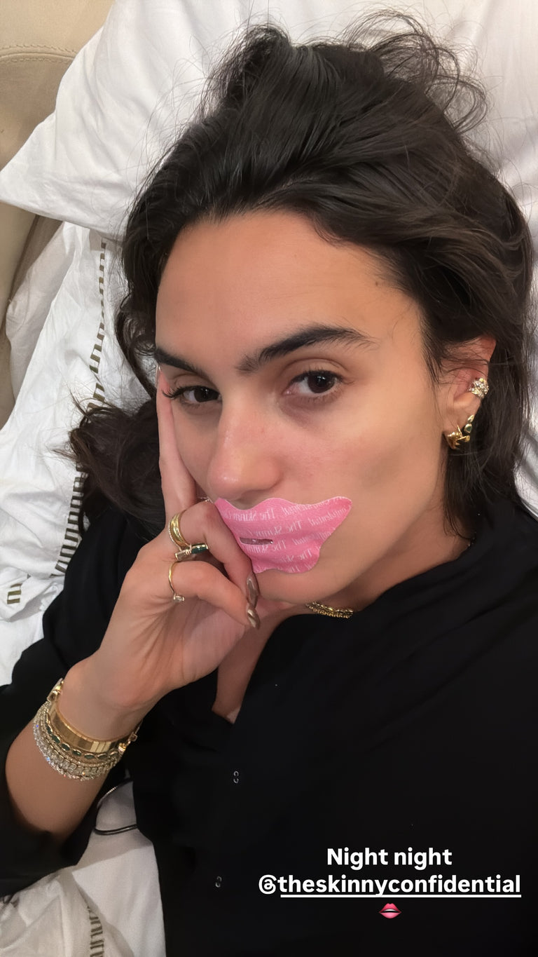 woman with lip mask lying on bed